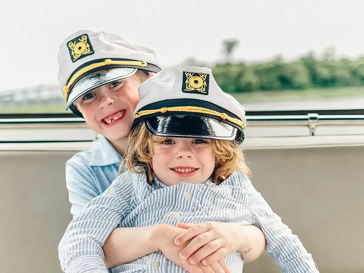 Two children enjoying a private yacht charter in Charleston