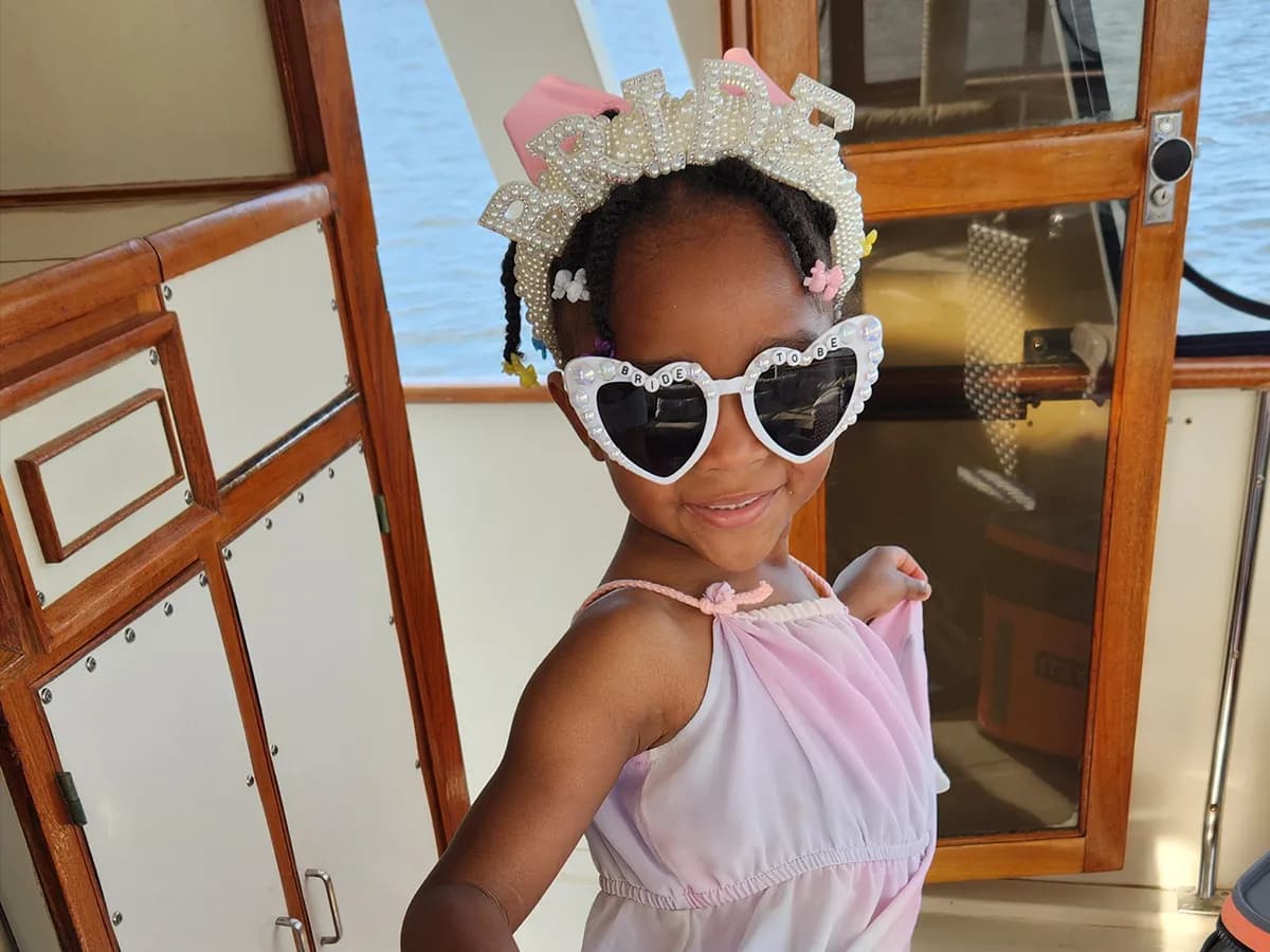 Young guest enjoying a private yacht charter